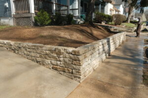 a retaining wall made with natural stone